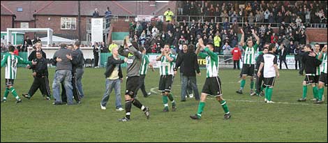 Players and fans celebrate the win by Blyth Spartans. Photo: Bill Broadley