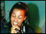 Young woman holding a mic