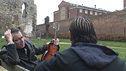 John Hegley with a project participant outside HM Prison Reading