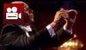 Goldie conducting