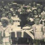'Old Mother Rielly and Kitty' Terry Darlow right foreground with dog Floss at VE Day street party 'Old Mother Rielly and Kitty' Terry Darlow right foreground with dog Floss at VE Day street party