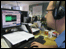 Ian Puckey editing audio on Radioman
