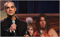 Robbie collecting his award