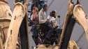 Puppeteers controlling the spider