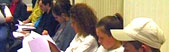 Image of actors reading over scripts