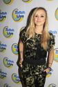 Fearne Cotton poses in front of a lovely looking background. Can we get some of that wallpaper for our bedrooms please?