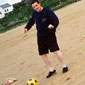 John eyeing up his shot and looking slightly off balance...