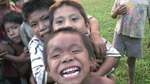 Steve and Matt receive plenty of help from the local children whilst filming in an Ashaninka community.