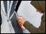 Graffiti artist at work on Jamaica St