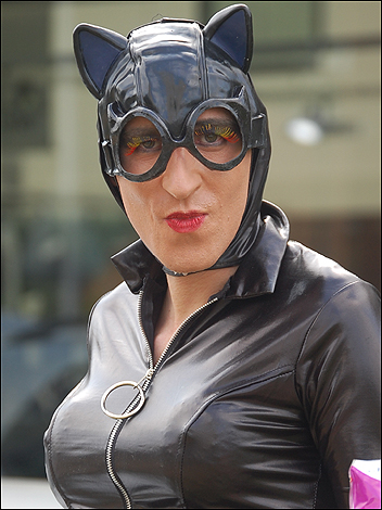 A man dressed up as catwoman