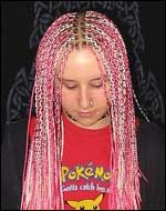 Girl with pink hair braids