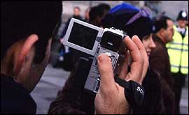 Man with video camera