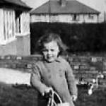 Beryl standing outside the bungalow that was later bombed. Beryl standing outside the bungalow that was later bombed.