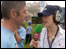 Charlie Charlton interviewing a man