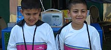 Kids wearing Asian Network Tee shirts