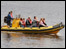 People riding the boats on the Clyde.