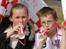 Young fans cheer the team on