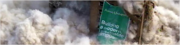 Tower block in mid demolish