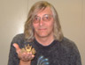 Mick Henry holding the plastic Coronation coach that he always longed to touch, and that used to be displayed in his grandparents' front room