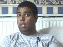 Qaman at his house