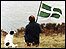 Man, dog and flag in harmony! 