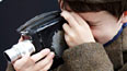 Child using vintage film camera