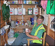 Pauline Wright inside shed