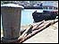 Bollard and boat