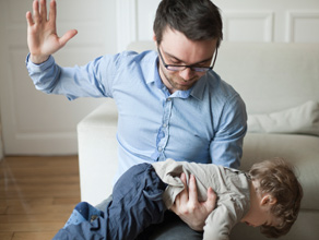 Parent smacking child