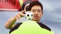 Yan dropping one tiny ball and one huge one