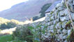An ornate curved stone wall