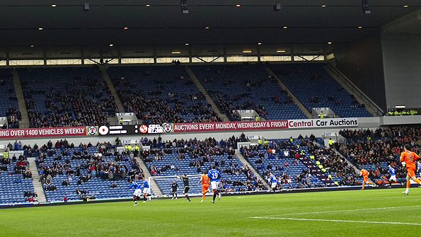 Sunday's Rangers-Dundee United Cup game was live on BBC TV, but the empty spaces around Ibrox did little to raise Rangers fans' spirits. Photo: SNS
