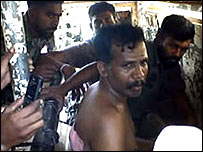 LTTE regional leader Ramesh being questioned in custody (photo: HRW)