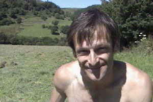 Alun cuts the corn