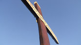 At the cross...