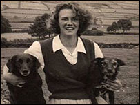 Elizabeth aged 15 with the dog (right) given to her by the soldiers as a puppy.