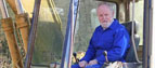 Richard Stilgoe and his digger.