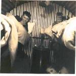 In the Anderson shelter, 1941, are Cyril (top left), David (top right), and me (bottom right) In the Anderson shelter, 1941, are Cyril (top left), David (top right), and me (bottom right)