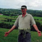 The green green grass of home - Peter Carragher, and in the background his home in Cullyhanna can be seen. The place he left for Canada all those years ago