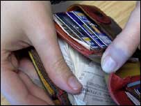 hand and wallet