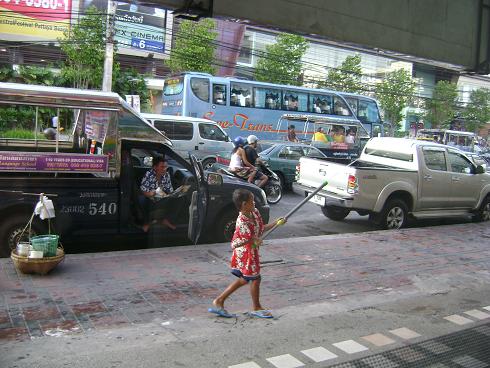 1children-with_plastic_pipe.JPG