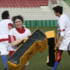 The team practise using pads