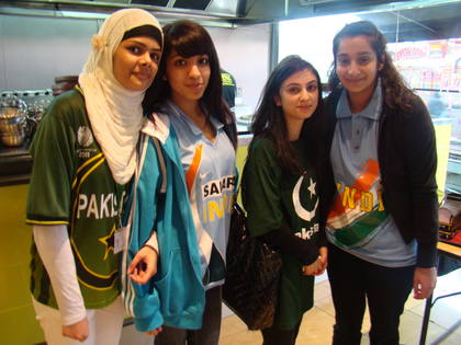 Both sets of supporters coming together to watch the match
