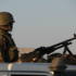 AU troops getting ready to go on patrol in Nyala