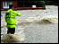 Policeman directs the waves