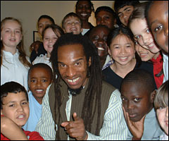 Benjamin Zephaniah with Medlock Primary pupils