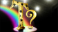 Golden letter T with paw prints and question mark with gold sparkly bone, all in a theatre spotlight