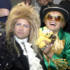 'David Bowie' and 'Elton John' get into character on set for the first of ten (thousand) takes.