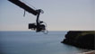 A camera pans over the bay