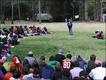 Fabian addressing children during the summer camp